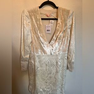 Never worn- we the free tags still on